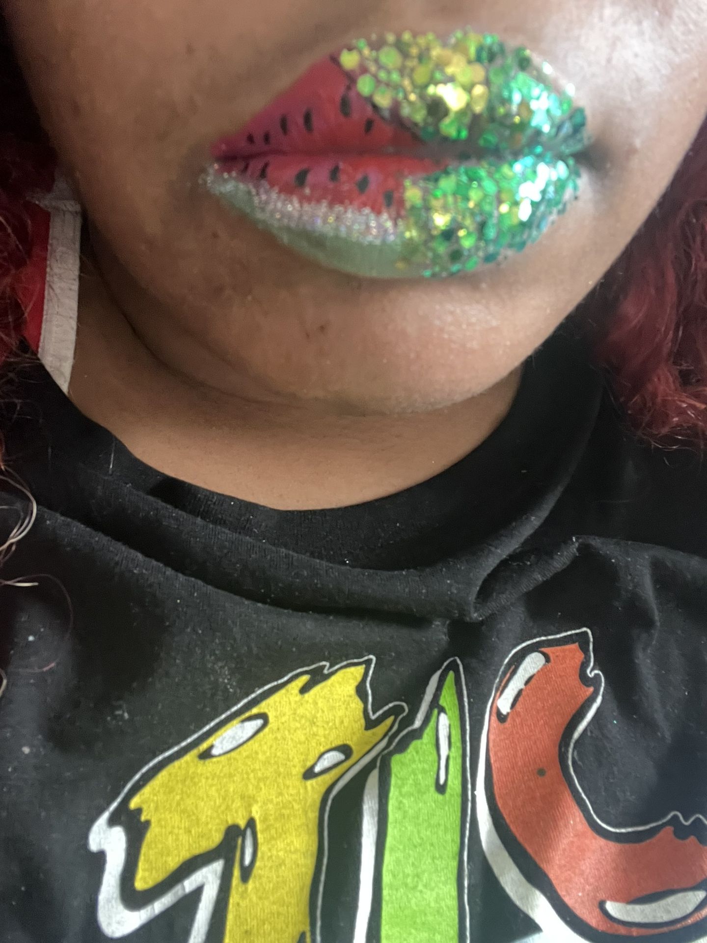 Black woman with multicolor crystal lip art, close-up portrait featuring iridescent gemstone texture and contemporary beauty artistry