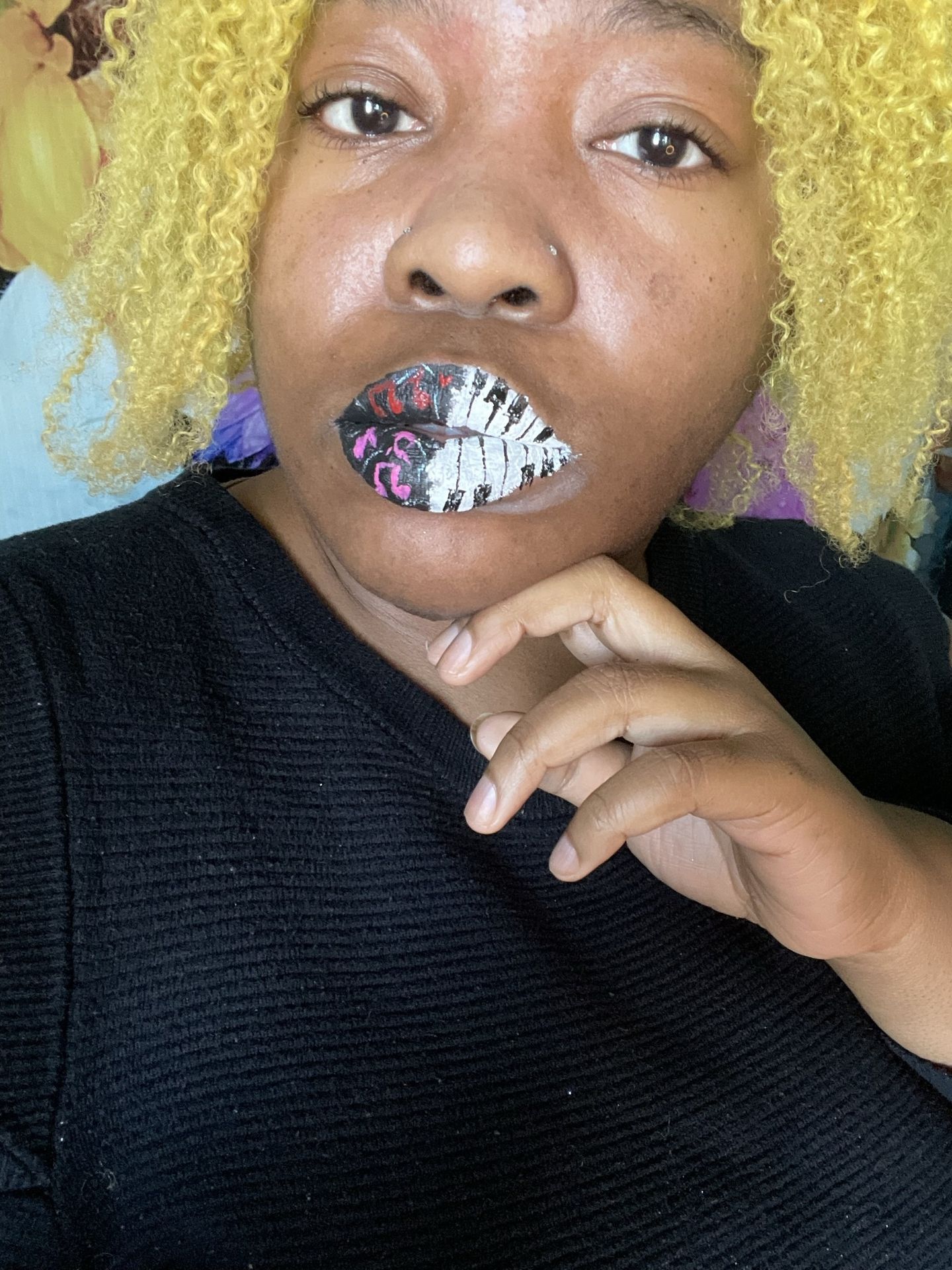 Black woman with pastel blue hair and silver crystal lip art, close-up beauty portrait featuring icy tones and reflective texture