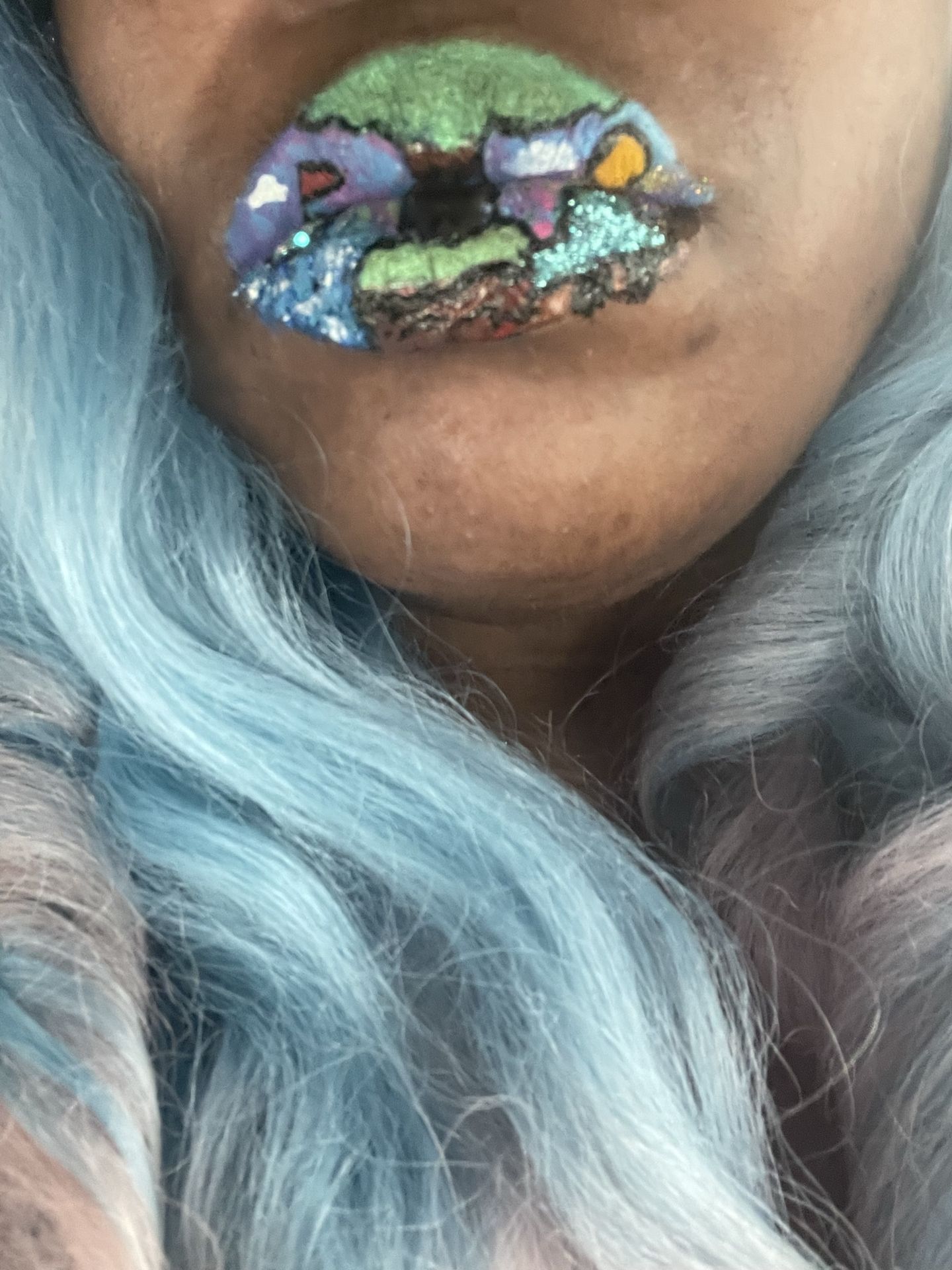 Close-up of rainbow gemstone lip mosaic with silver hair framing the face
