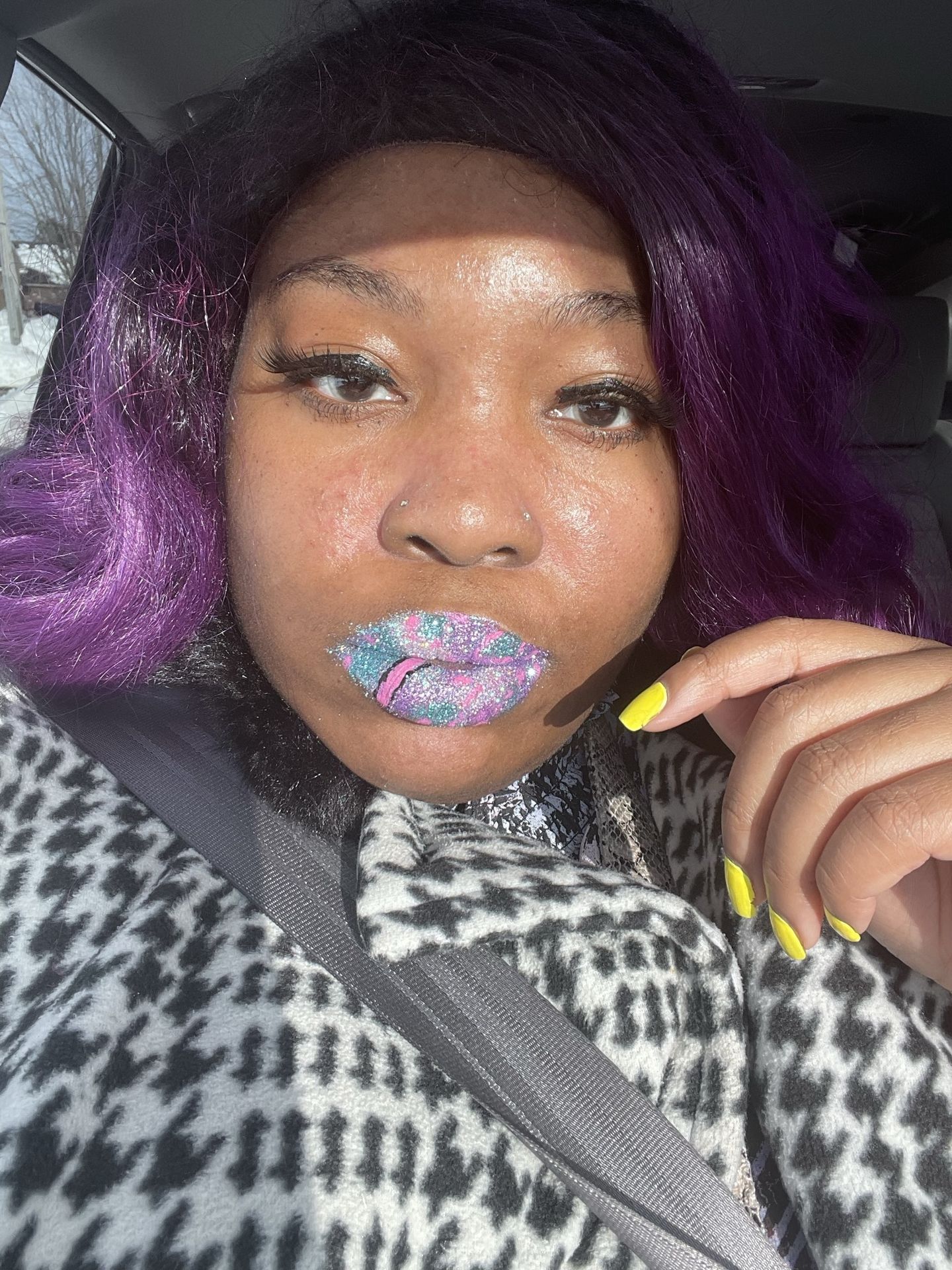 Woman with deep violet hair and pale lilac shimmer lips